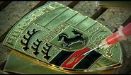 Manufacturing an unmistakable trademark: the Porsche Crest