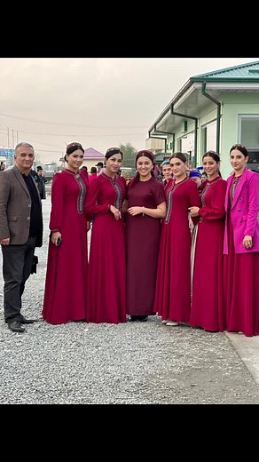 Traditional Attire Showcase: Women in Red Dresses