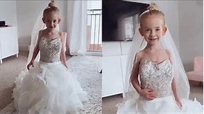 Adorable Little Girl Tries On Mum's Wedding Dress