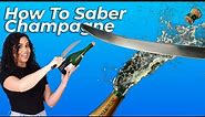 How To Saber A Bottle Of Champagne In 1 Minute!
