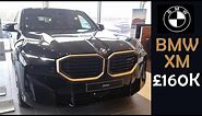 BMW XM Hybrid - Black Sapphire with Gold Accents