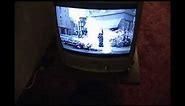 Vintage Magnavox TV stand and 2004 Sanyo TV