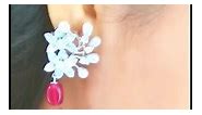 Diamonds n pearls floral design earrings with wine colour pearl drop. #foryoupage #trendyjewelz #jewellery #earrings Trendy Jewelz | Trendy Jewelz