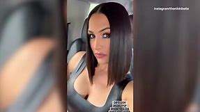 Nikki Bella poses before making her 'Daily Pop' appearance