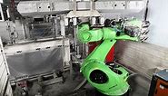 KUKA robot handles and measures concrete railway sleepers