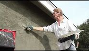 Apply a skip trowel texture with base coat stucco.