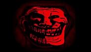 troll face frowning then quickly smiling while becoming red with music