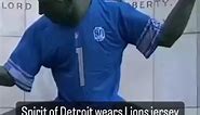 The Spirit of Detroit wearing a Lions jersey as the team heads into the postseason
