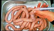 How Sausages Are Made. How To Make Sausages. Traditional Butchers Sausages. Mixing filling & Linking