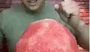 Asian eats watermelon fast