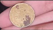 50 Cent Peso Coin Found Lying In Street On Windy Day