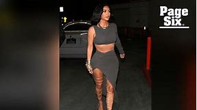 Kim Kardashian steps out in laced-up-to-there stiletto heels