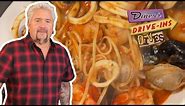 Guy Fieri Eats the "Seafood Buffet for 90" in Baltimore | Diners, Drive-Ins and Dives | Food Network
