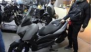 Where is the battery - YAMAHA XMAX