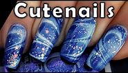Water marble nail art : cute blue gradient glitter nails