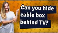 Can you hide cable box behind TV?