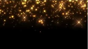 falling golden glitter particles light background video