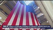 World's largest American flag raised in Chicago Macy's