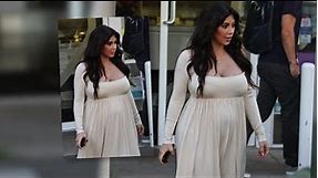 Kim Kardashian Busts Out of Her Maxi Dress