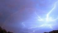 Lightning bolt strikes across rainbow in Tulsa