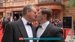 Downton Abbey stars kiss on the red carpet