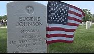 Scouts honor veterans for Memorial Day with flags on gravesites