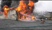 PRE-ARRIVAL: Firefighters battle fire in auto repair shop, North Whitehall, PA.