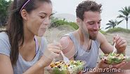 Happy Young People Eating Healthy Salad for Lunch Stock Video - Video of running, lettuce: 188488851