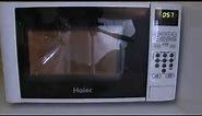 Review Haier MWM0701TW 700 Watt Countertop Microwave