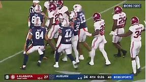Iron Bowl fight knocks over ref + Alabama pick 6 to end the game