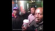 Black men holding a Starbucks cup!