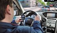 Texting While Driving: How Dangerous is it? - CAR and DRIVER