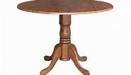 42" Round Solid Wood Dual Drop Leaf Pedestal Table in Oak Finish