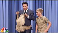 Robert Irwin and Jimmy Cuddle a Sloth