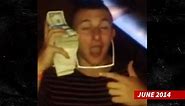 Johnny Manziel -- HOLDING BRICK OF CASH ... Pretends It's Cell Phone
