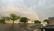 Lightning Strikes Amid Double Rainbow in Central Texas