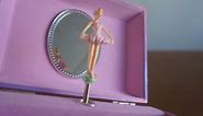 Play with the pink and purple MUSIC BOX with ballerina dancing on SWAN LAKE music