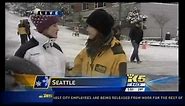 2012 Seattle Snow - KING 5 reporter accosted by an angry snow tuber!