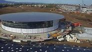 Latest 4K drone footage of Apple's 'spaceship' Campus 2 shows interior auditorium work, significant landscaping | AppleInsider