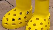 MSCHF and Crocs reveal big yellow boots collaboration at Paris Fashion Week