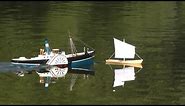 Paper ships festival. Sailboat and steamboat models.