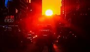 ‘Manhattanhenge’ lights up New York City streets
