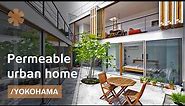 Permeable Yokohama home blends with garden & protects from street