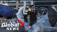Hong Kong protests continue as police use tear gas to disperse crowds