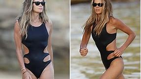Elle Macpherson, 53, shows off her killer body in a black cut-out swimsuit as she hits the beach in Sydney