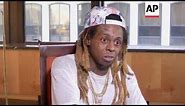 Lil Wayne stands by his 'no such thing as racism' comment.
