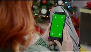 Free 4K Green Screen Video: Woman Holding Mobile Phone - Add a High-Tech Touch to Your Content