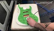 Staining guitar with green burst