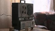 Old Reel-to-reel Tape Recorder Plays Tape. Retro Concept of Turntable Reel To Reel Tape Recorder