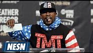 Floyd Mayweather Shows Off $100,000,000 Check In McGregor's Face